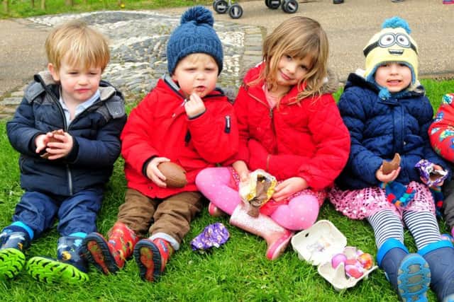 Photo: David Hurst
Eggs are for eating for, from left, Benjamin Maddocks, James and Olivia Bourne and Alice and William Thompson, at the Avenham Park Easter Egg Rolling event.
