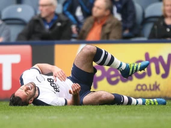 Greg Cunningham down in pain after breaking his leg.