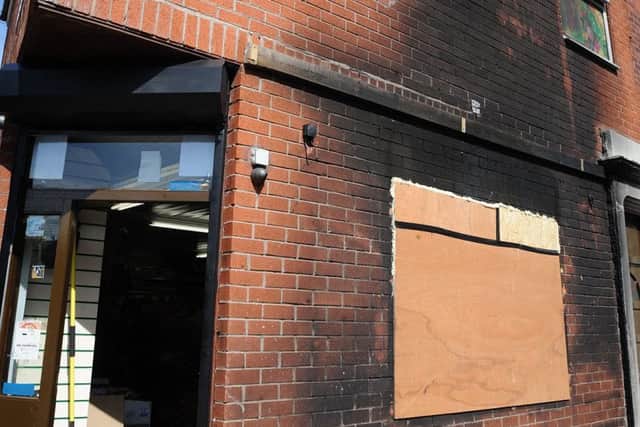 An arsonist went on the rampage in the Deepdale area of Preston in the early hours of Good Friday, leaving a trail of destruction behind them.
The blackened exterior of a shop on Castleton Road.  PIC BY ROB LOCK
18-4-2017