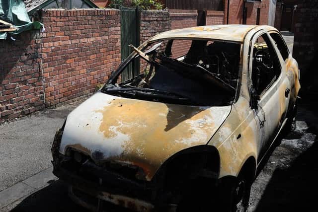 A car was set on fire in an alley behind Hawkhurst Road which spread to a nearby house.