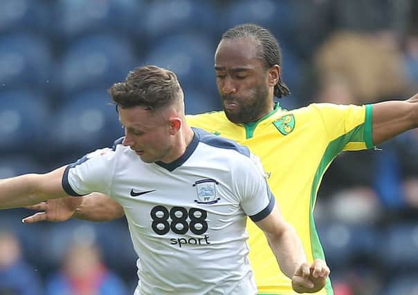 Shielding the ball from Norwich striker Cameron Jerome on Easter Monday