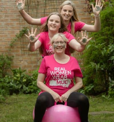 Breast cancer survivor Emma Ryan with her daughters left Leah and right Bethany