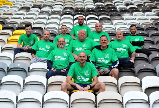 PNE fan Ian Bamber and his team part in a sponsored bums on seats challenge for Macmillan Cancer Support, aiming to sit on every one of the 23,404 seats of Deepdale stadium between them