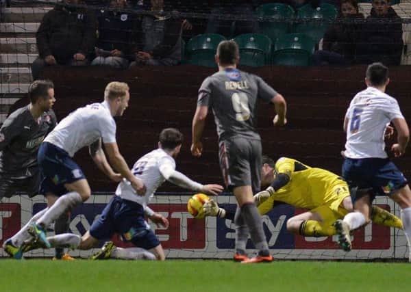Joe Garner falls to the floor after heading Preston into the lead against Rotherham at Deepdale in February 2014