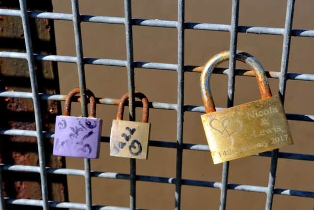 Love locks left on the Avenham bridge