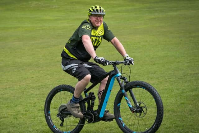 Trying out electric bikes in Avenham Park as part of an initiative to promote green commuting. Paul Wood.