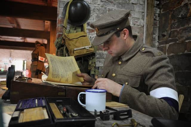 Members of the re-enactment and historical group Echoes of a Gilded Age gave a programme of demonstrations and talks on World War One at Hoghton Tower. Sapper Barman at his desk
