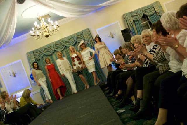 Models on the catwalk at Shaw Hill Golf Club in aid of Alder Hey