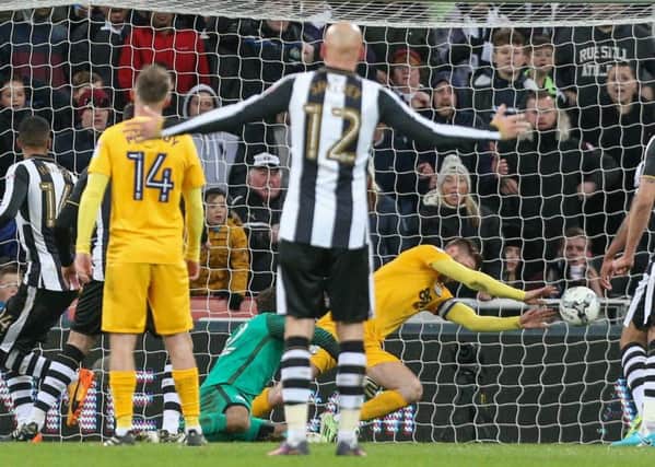 Gallagher dives to his left to keep out Isaac Hayden's shot at Newcastle, resulting in a straight red card