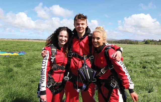 Eleanor Kirton, Henry Booth and Eden Stafford, of Lantei, who have done a sky dive for St Catherine's Hospice