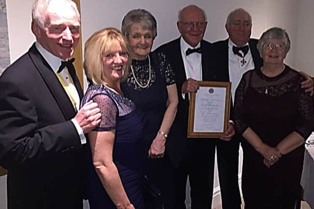 The picture shows Longridge Catenians new president Ted Donnelly with his wife Janis, Angela and Gerard Waddingham receiving their certificate of 50 years membership and the National President Peter Roberts with his wife Joan.