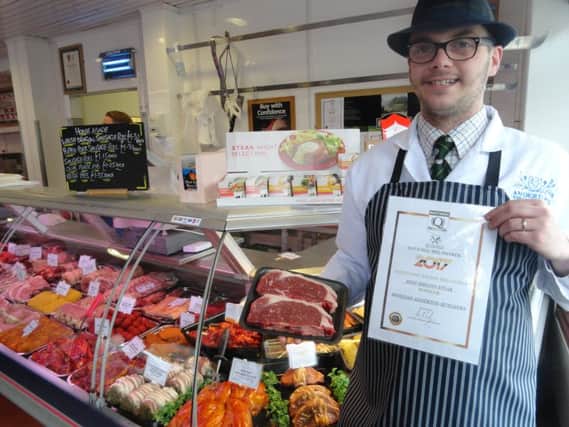 Max Roberts with The Best Steak in the North West of England Award on behalf of Anderton's Butchers for its Ribble Reward Steak