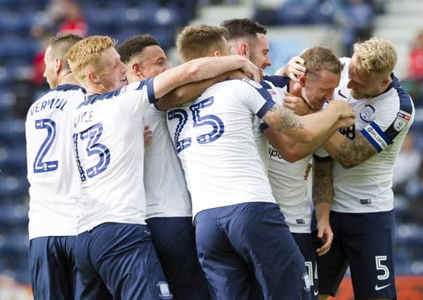 Aiden McGeady is congratulated on his first PNE goal against Barnsley.