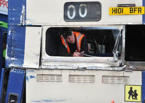 Photo Neil Cross
Driver Kevin Gow of Preston Bus on board one of the destroyed buses