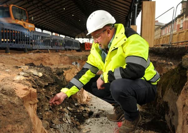 Photo Neil Cross
Mark Pallett, Site Manager on the Preston Market construction with some of the ancient seashells