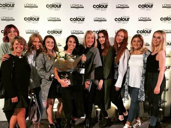 No77 Creative Hair won the L'Oreal Colour Trophy Star Award for the North West. Gina is holding the flowers