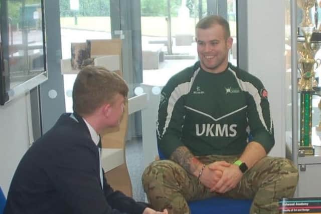 Greg Dunnings from UK Military School with Fulwood Academy student Bradley Walch.