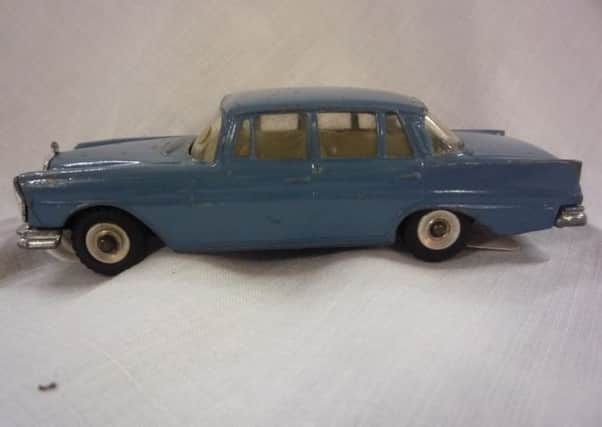 A blue Dinky Toys Mercedes