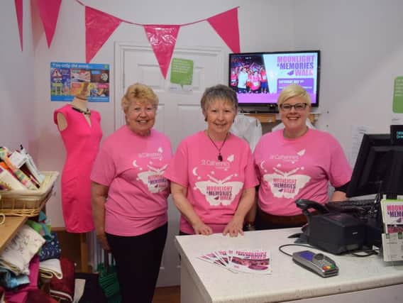 Staff and volunteers at the St Catherines Fulwood shop promote the hospices Moonlight and Memories Walk in store