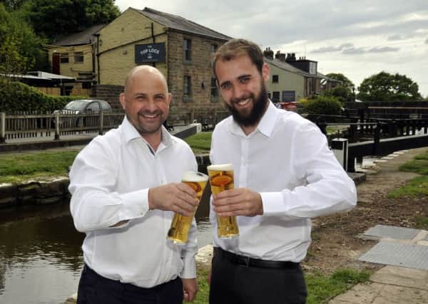 New licensee Mike Hales and his manager Curtis Lunt at the newly refurbished Top Lock Pub in Wheelton.