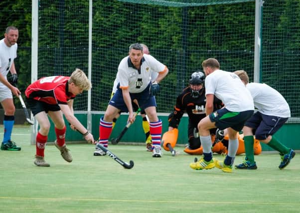 Action from Leyland and Chorley Hockey Club's World Record attempt at the most players in an exhibition match.