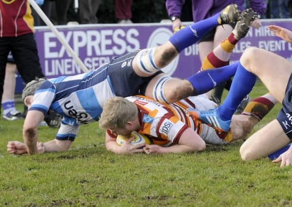 Alex Loney, pictured in action for Fylde, suffered  what is feared to be a torn Achilles in Lancashire's victory over Cheshire