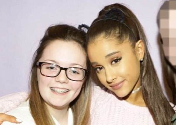 Georgina meeting her idol Ariana Grande at a gig two years ago