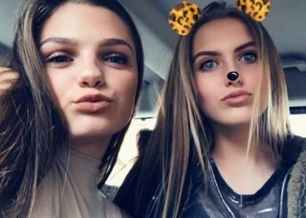 Ella Hartley (right), from Catterall, pictured with friend Charlotte Barnes on the way to the Ariana Grande concert on Monday night.