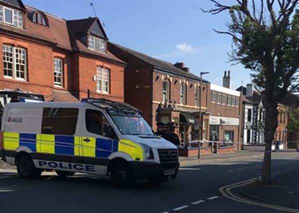 Photo taken with permission from the Twitter feed of June Marcroft of police on a street in Wigan