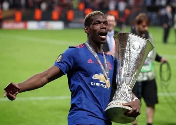 Manchester United's Paul Pogba with the trophy after winning the UEFA Europa League Final