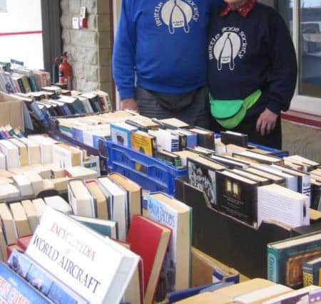 John and  Gertie Farmery at theri charity book sale on Easter Saturday.