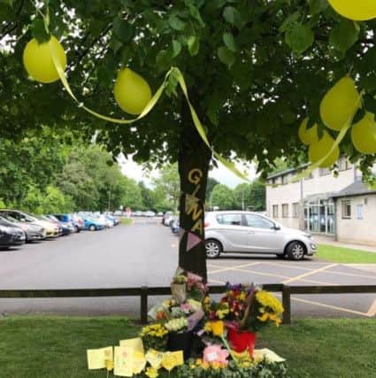 A floral tribute to Manchester terror attack victim Georgina Callander at Runshaw College, where she was a student.