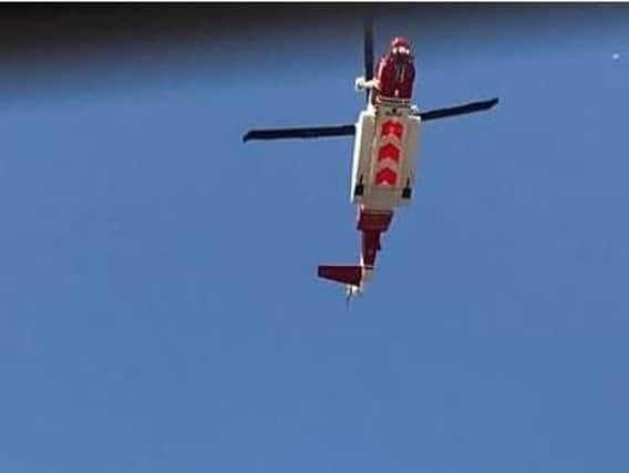 The coastguard's emergency rescue helicopter was called in to assist