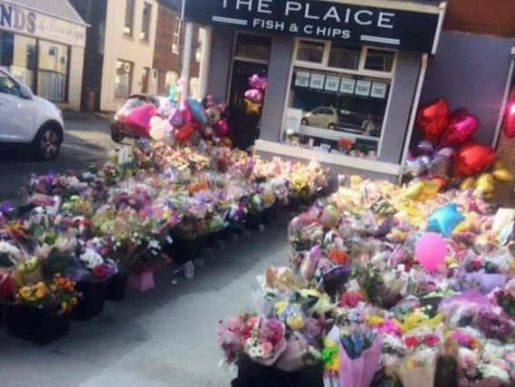 Flowers and tributes continue to pour in at the chip shop in Leyland believed to have been run by the parents of Saffie Rose Roussos.