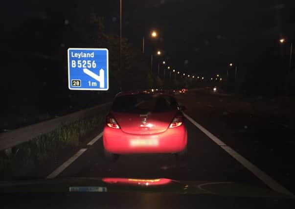 A car was pulled over near Junction 28 of the M6. Photo: Lancs Roads Police