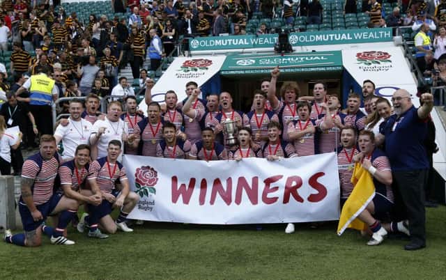 Lancashire celebrate with the Trophy after the Bill Beaumont Division One Cup Final match at Twickenham