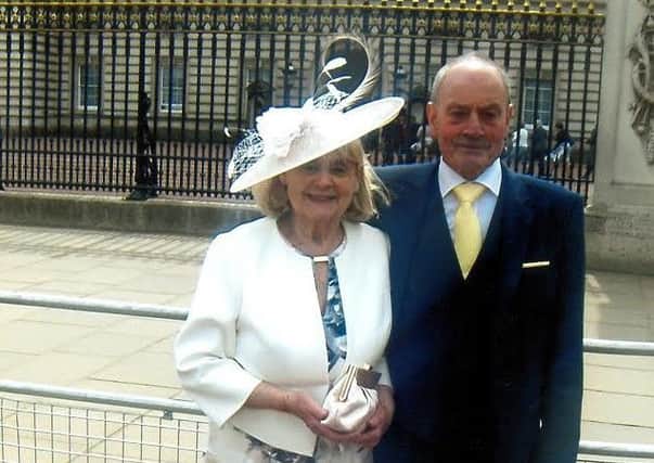 Jos and George outside Buckingham Palace
