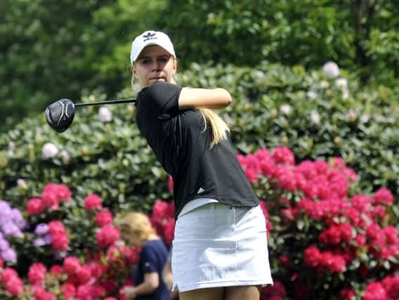 Annabell Fuller in action for England against Spain at Preston Golf Club