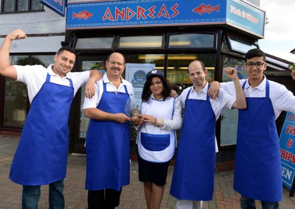 Photo Neil Cross
LEP Chippy of the year winners Andreas and Eleni Evangelou with their boys, Marios, Evangelos and Constantinos, at their fish and chip shop in Penwortham