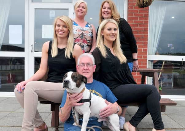 Photo: David Hurst
Diesel, who was a Homeless Hound is joined by his owner, Lester Finch, Shop2Drop models, Ellie Coxhead, left and Beth Talbot, right, and organisers of a Homless Hounds Fashion Show at Bamber Bridge Football Club, Jane Kitchen, rear left and Louise Butcher, rear right.