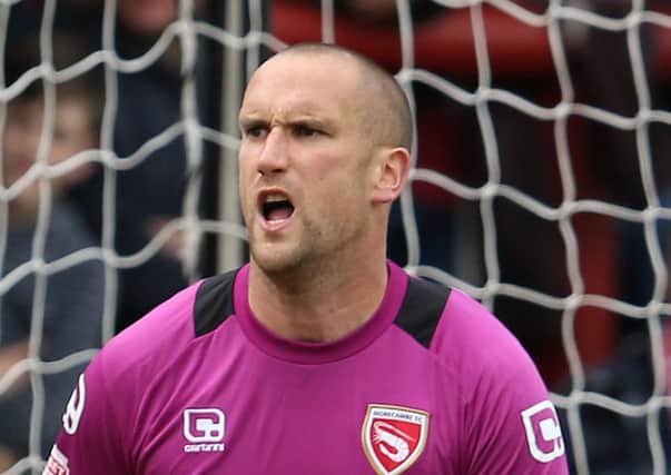 Barry Roche has signed a new deal with Morecambe