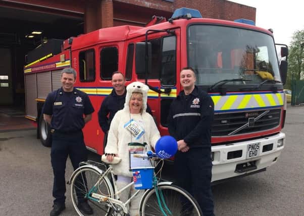 Karen Rothwell was helped along by the fire brigade on her 'Dorset Dash'