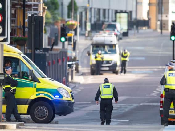 Police in Southwark Bridge Road near the scene of Saturday's terrorist incidents