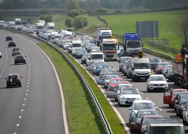 Traffic on the westbound M55. Stock photo.