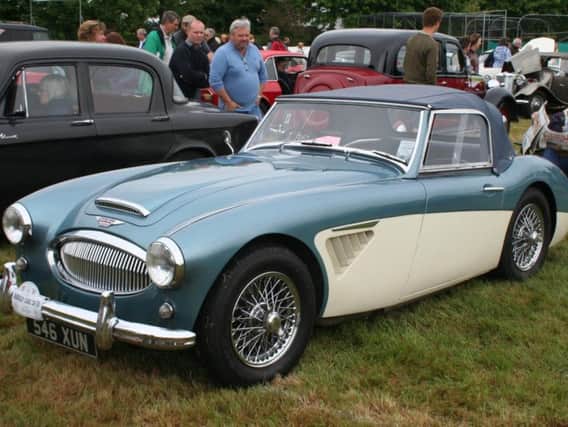 Some of the English classic sports cars on display at the Classic Car and Motor Bike Show held at Mawdesley Cricket Club