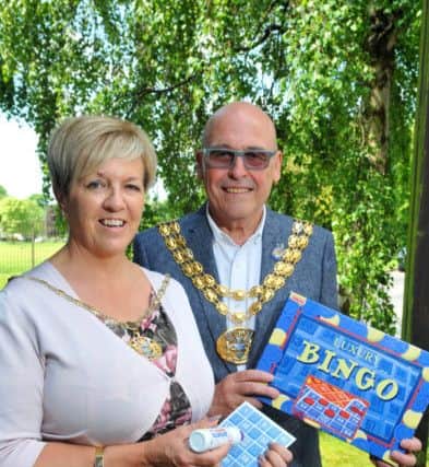 The Mayor and Mayoress of South Ribble, Coun Mick and Carole Titherington working as bingo callers at the event