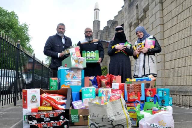 Photo Neil CrossIlyas Esmail, Saeed Atcha, Sofia Begum-Ali and Sara Suleman at Jamea Masjid mosque on Clarendon Street, Preston with a small portion of the  food they have collected for the Salvation Army food bank