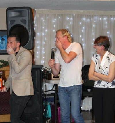 Dean Edwards and Colin Hendry have a fit of giggles at a charity night in aid of St Catherine's Hospice