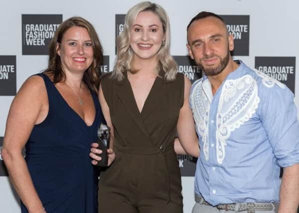 L-R - Helen Connolly from Bonmarche, UCLan student Caroline Bowden and Celebrity Stylist and Bonmarche Stylist Mark Heyes after Caroline won an award at Graduate Fashion Week in London.