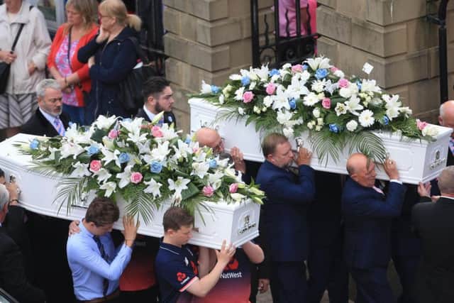 The coffins of Chloe Rutherford (right) and Liam Curry, who were killed in the Manchester Arena bombing, arriving at St Hilda's Church in South Shields, South Tyneside, for their funeral service